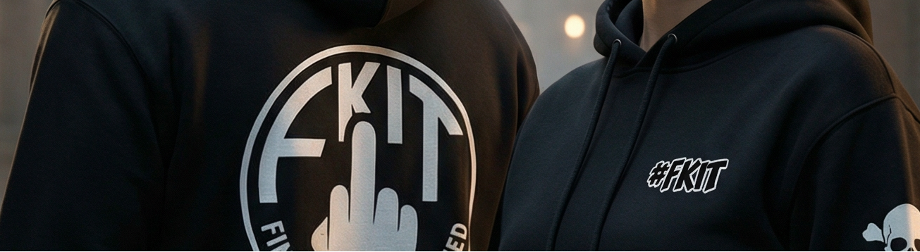 Two people wearing black hoodies with visible branding in an urban setting.